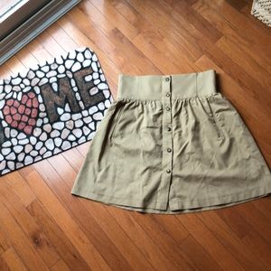 Tan skirt with forgiving waist.